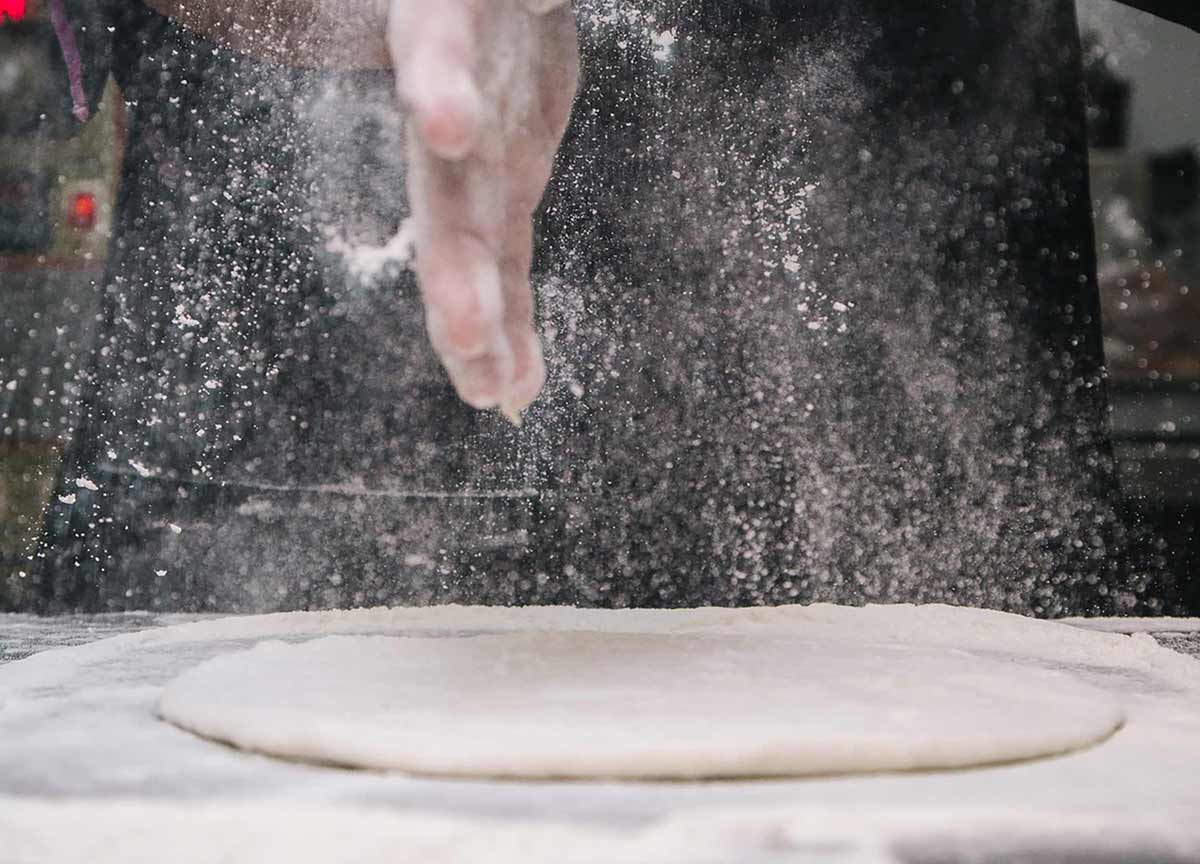 Préparation d'une pizza